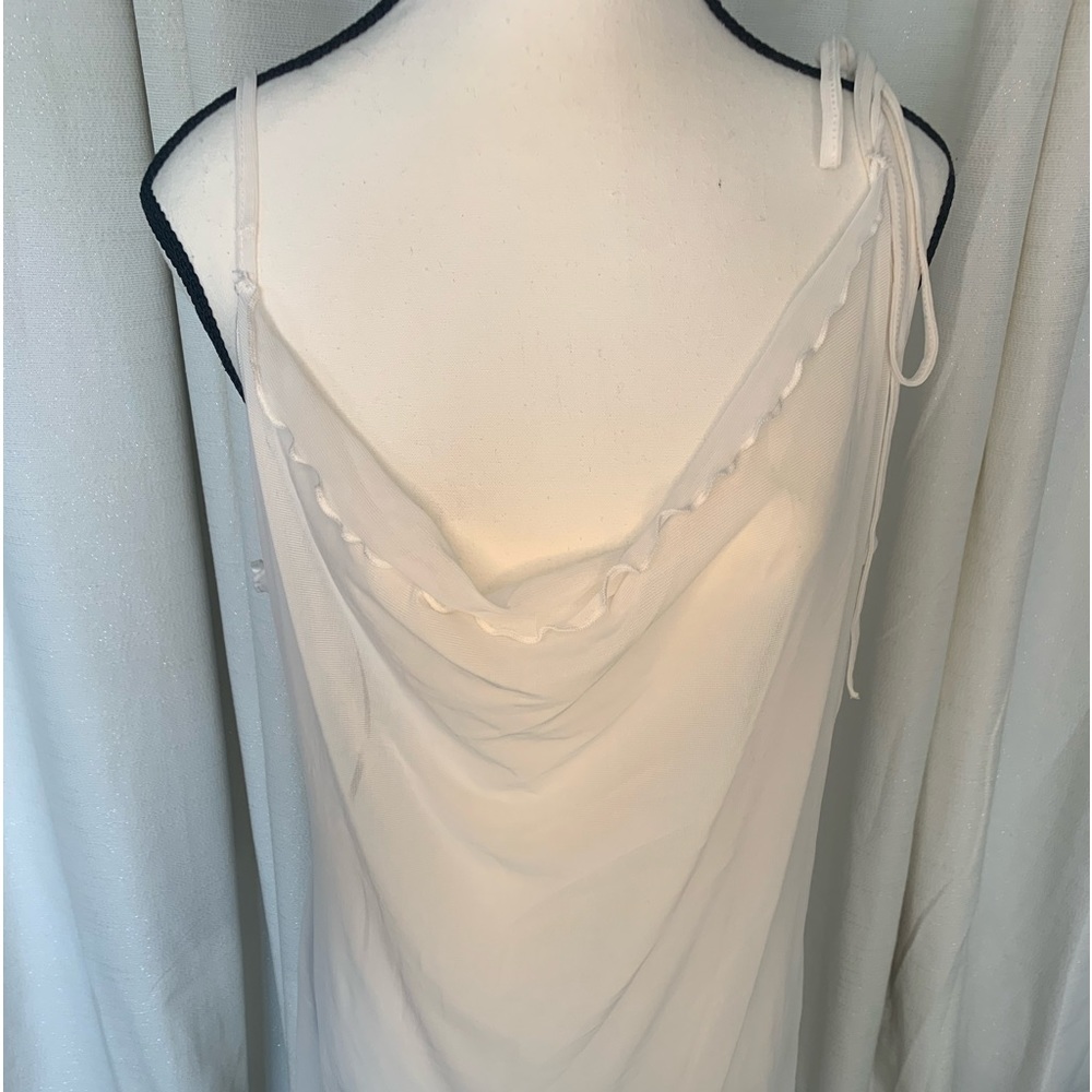 Sheer white top or short dress